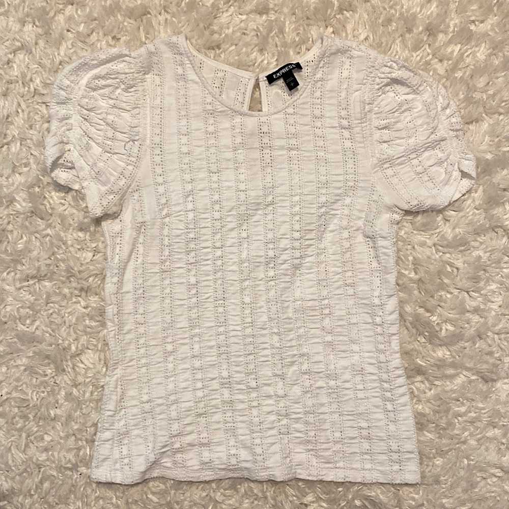 Short sleeve white blouse with slight puff sleeves. Size small. Brand - Express.